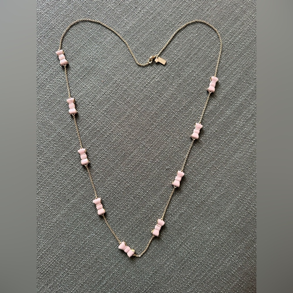 Kate Spade Take a Bow pink & gold tone necklace!